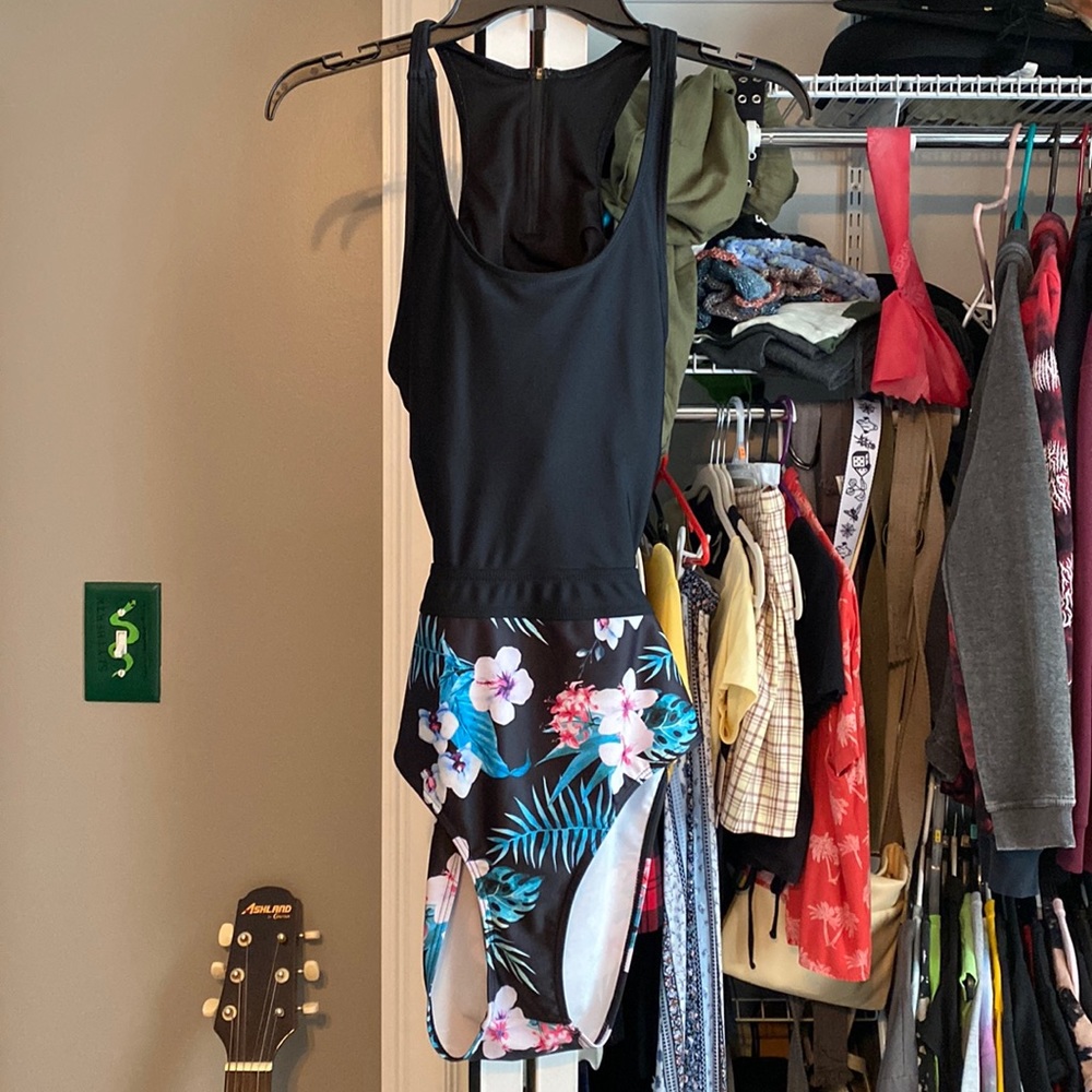 Black and floral one piece bathing suit